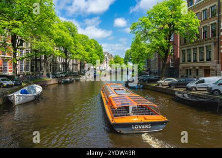 Bateau touristique sur le canal Herengracht, Amsterdam, pays-Bas, Europe Banque D'Images