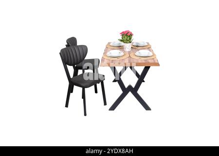 Ensemble de salle à manger moderne à l'extérieur avec table en bois, chaises en métal noir et table élégante pour quatre personnes Banque D'Images