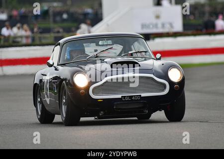 Jimmie Johnson, Dario Franchitti, Aston Martin DB4GT, Stirling Moss Memorial Trophy, avec des voitures GT à cockpit fermé qui ont couru avant 1963, un Banque D'Images