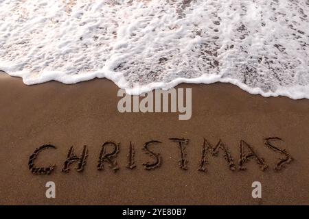 inscription mary christmas au bord de la mer Banque D'Images