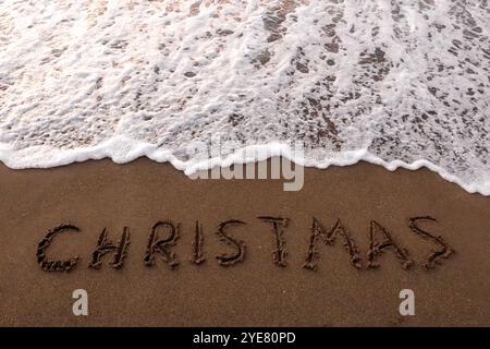 inscription mary christmas au bord de la mer Banque D'Images