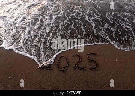 Inscription de Noël 2005 sur la plage d'été Banque D'Images