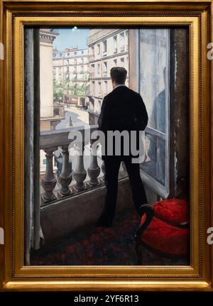 Paris, France - 11 01 2024 : Musée d'Orsay. Jeune homme à sa fenêtre par Gustave Caillebotte Banque D'Images