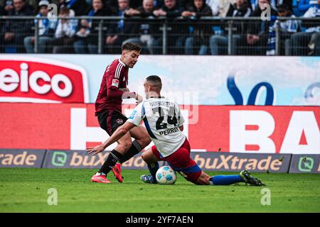 Stefanos TZIMAS (1. FC Nuernberg, #09), Lucas Perin (Hamburger SV, #24) GER, Hamburger SV vs. 1. FC Nuernberg, Fussball, 2. Bundesliga, Spieltag 11, saison 2024/2025, 03.11.2024 LES RÈGLEMENTS du LDF INTERDISENT TOUTE UTILISATION DE PHOTOGRAPHIES COMME SÉQUENCES D'IMAGES ET/OU QUASI-VIDÉO Foto : Eibner-Pressefoto/Marcel von Fehrn Banque D'Images