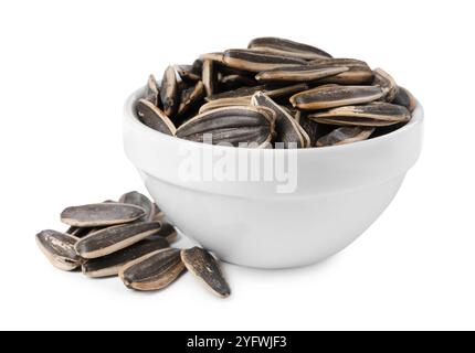 Graines de tournesol dans un bol isolé sur blanc Banque D'Images