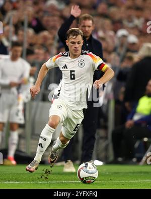 MUNICH, ALLEMAGNE - 14 OCTOBRE : Joshua Kimmich, Allemand, court avec un ballon lors du match de l'UEFA Nations League 2024/25 League A Group A3 entre l'Allemagne et les pays-Bas le 14 octobre 2024 à Munich, Allemagne. © diebilderwelt / Alamy Stock Banque D'Images