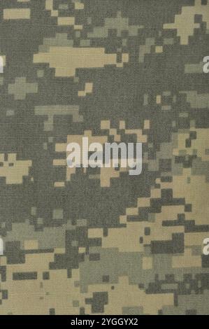 Modèle de camouflage universel, camo numérique uniforme de combat de l'armée USA militaire ACU macro closeup grand fond vertical naturel de texture de tissu ripstop Banque D'Images