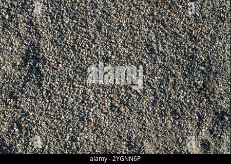 fond avec texture de cailloux, petite matière première de gravier dans la fabrication du béton Banque D'Images