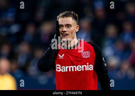 Bochum, Allemagne. 09 novembre 2024. Football : Bundesliga, VfL Bochum - Bayer Leverkusen, Journée 10, Vonovia Ruhrstadion : Leverkusen's Florian Wirtz Reacts. Crédit : David Inderlied/dpa - NOTE IMPORTANTE : conformément aux règlements de la DFL German Football League et de la DFB German Football Association, il est interdit d'utiliser ou de faire utiliser des photographies prises dans le stade et/ou du match sous forme d'images séquentielles et/ou de séries de photos de type vidéo./dpa/Alamy Live News Banque D'Images