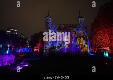 La princesse Elizabeth et Winston Churchill sont représentés lors du 'Poppy Fields at the Tower', un spectacle son et lumière sur la période du souvenir à la Tour de Londres. Historic Royal Palaces s’est associé à Luxmuralis pour présenter une installation qui emmènera les visiteurs dans un voyage à travers des projections sonores et lumineuses spécialement créées. Les projections présenteront des œuvres d’art reflétant la première Guerre mondiale et la seconde Guerre mondiale qui transformeront l’architecture des bâtiments emblématiques de la Tour. Date de la photo : samedi 9 novembre 2024. Banque D'Images