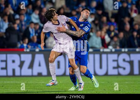 Getafe, Madrid, Espagne. 10 novembre 2024. Bryan Gil du Girona FC (l) en action contre Diego Rico du Getafe CF (R) lors du match de football la Liga EA Sports 2024/25 entre Getafe CF et Girona FC à l'Estadio Coliseum le 10 novembre 2024 à Getafe, Espagne. (Crédit image : © Alberto Gardin/ZUMA Press Wire) USAGE ÉDITORIAL SEULEMENT! Non destiné à UN USAGE commercial ! Banque D'Images