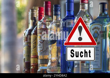 Image symbolique, signe d'avertissement pour la dépendance à l'alcool, danger de dépendance, abus d'alcool, avertissement de santé, boissons alcoolisées, bar, boissons alcoolisées, yo Banque D'Images