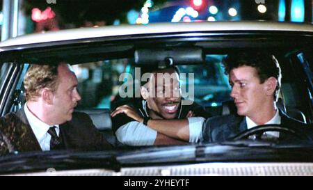 BEVERLY HILLS COP 1984 film Paramount Pictures avec de gauche à droite : John Ashton, Eddie Murphy, Judge Reinhold Banque D'Images