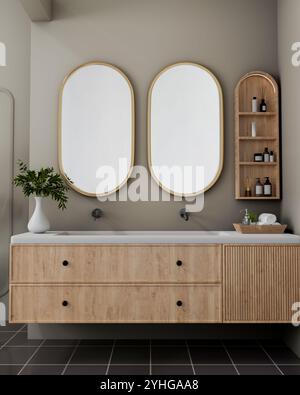 Le design intérieur d'une salle de bains contemporaine et élégante dispose d'un meuble de toilette en bois minimaliste avec un lavabo, de doubles miroirs ovales modernes sur un gris Banque D'Images