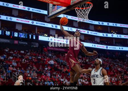Cypress, Texas, États-Unis. 9 novembre 2024. Le gardien de l'État de Floride JAMIR WATKINS (1) dunque le ballon pendant le match de samedi, au Toyota Center de Houston, Texas. (Crédit image : © Domenic Grey/ZUMA Press Wire) USAGE ÉDITORIAL SEULEMENT! Non destiné à UN USAGE commercial ! Banque D'Images