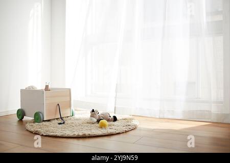 Wagon-jouet et animaux en peluche placés sur le rebord de la fenêtre Banque D'Images