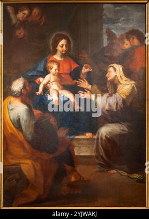 PAVIE, ITALIE - 8 SEPTEMBRE 2024 : la peinture de la Sainte famille avec le saint dans l'église Basilica di San Michaele Maggiore par artiste inconnu. Banque D'Images