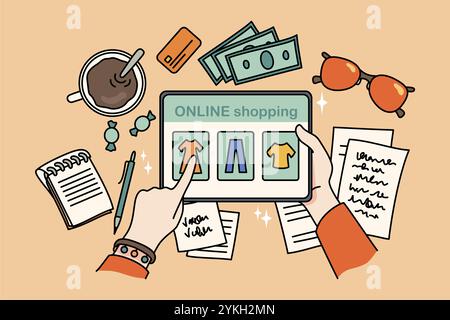 Vue de dessus gros plan de la personne s'asseoir à table shopping en ligne sur le gadget de tablette. Une femme achète des vêtements sur Internet sur un pad moderne. Commande Web, mode et Banque D'Images