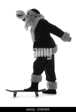 Silhouette de Père Noël avec skateboard sur fond blanc Banque D'Images