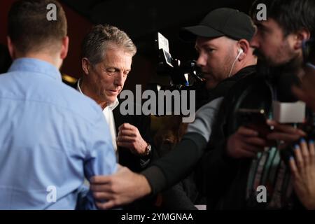 Madrid, Espagne. 13 février 2022. L'acteur britannique Hugh Grant assiste à la photocall pour la première du film Heretic au cinéma Kiniopolis à Madrid, 21 novembre 2024 Espagne crédit : Sipa USA/Alamy Live News Banque D'Images