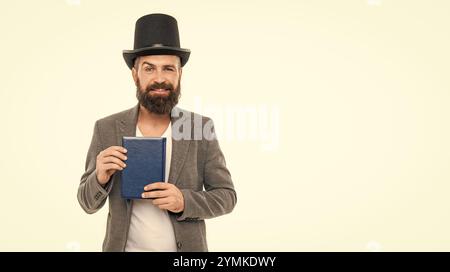 Professeur d'université. Livre de présentation de professeur. Livre éducatif d'étude d'enseignant d'homme. Journée des enseignants. Retour à l'école. Concept d'éducation. Connaissance de Banque D'Images