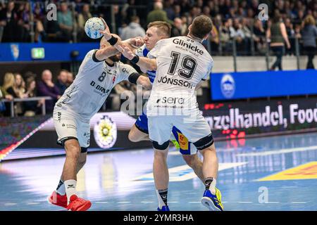 Simone Mengon (ThSV Eisenach, #15), Adrian Sipos (Kreislaeufer, MT Melsungen, #8), Elvar Oern Jonsson (Rueckraum Mitte, MT Melsungen, #19) GER, Thueringen, ThSV Eisenach gegen MT Melsungen, Handball, Daikin 1. Handballbundesliga, 11.Spieltag, saison 2024/2025, Freitag, 22.11.2024, 19,00 Uhr Foto : Eibner-Pressefoto/Martin Herbst Banque D'Images