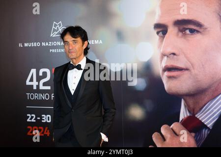 Turin, Italie. 22 novembre 2024. Giulio base sur le tapis rouge de l'événement d'ouverture du Festival du film de Turin 2024 crédit : Marco Destefanis/Alamy Live News Banque D'Images