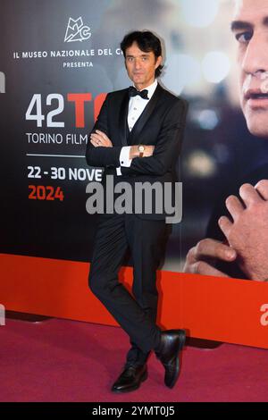 Turin, Italie. 22 novembre 2024. Giulio base sur le tapis rouge de l'événement d'ouverture du Festival du film de Turin 2024 crédit : Marco Destefanis/Alamy Live News Banque D'Images