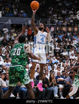 Honolulu, Hawaï, États-Unis. 22 novembre 2024. Le garde de Caroline du Nord RJ Davis (4) tire la balle lors du match de basket-ball de la NCAA 2024 entre les North Carolina Tar Heels et les Rainbow Warriors de l'Université d'Hawaï au stade SimpliFi au Stan Sheriff Center à Honolulu, Hawaï. Glenn Yoza/CSM/Alamy Live News Banque D'Images