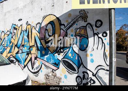 Artiste graffiti peinture murale sur Kingston Road à Scarborough, Toronto, Ontario, Canada Banque D'Images