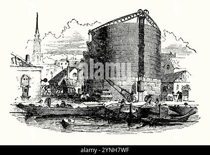 Une vieille gravure de City of London Gasworks à l'époque victorienne. Il est tiré d'un livre des années 1890 sur les découvertes et les inventions au cours des années 1800 Des usines gazières locales pour la production de gaz de ville à des fins d'éclairage et de chauffage étaient disséminées dans toute la ville. Les barges sur la Tamise apportaient le charbon. Le gaz était stocké dans le grand réservoir de gaz circulaire (réservoir de gaz ou gazomètre centre droit). En 1820, la City of London Gas Light and Coke Company construisit un ouvrage sur le front de rivière à la jonction de Dorset Street et New Street, Blackfriars. Banque D'Images