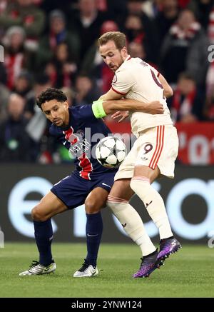 MUNICH, ALLEMAGNE - NOVEMBRE 26 : Harry Kane du Bayern Muenchen affronte Marquinhos du FC Paris Saint Germainlors du match MD5 de l'UEFA Champions League 2024/25 entre le FC Bayern München et le Paris Saint-Germain au Football Arena Munich le 26 novembre 2024 à Munich, Allemagne. © diebilderwelt / Alamy Stock Banque D'Images