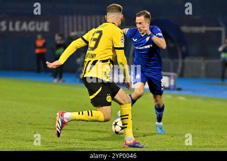 Zagreb, Croatie. 27 novembre 2024. Zagreb, Croatie, 27 novembre 2024 : Lukas Kacavenda du Dinamo Zagreb (R) en action contre Pascal Gross du Borussia Dortmund (l) lors de la Ligue des Champions de l'UEFA, phase de Ligue, match entre le Dinamo Zagreb et le Borussia Dortmund au stade Maksimir, Zagreb, Croatie. (Igor Kupljenik/SPP) crédit : SPP Sport Press photo. /Alamy Live News Banque D'Images