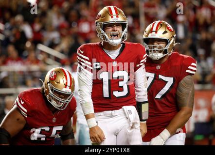 Santa Clara, États-Unis. 27 octobre 2024. Le quarterback des 49ers de San Francisco Brock Purdy (13 ans) célèbre son touchdown contre les Cowboys de Dallas dans le troisième quart-temps au Levi's Stadium de Santa Clara, Californie, dimanche 27 octobre 2024. (Photo de Nhat V. Meyer/Bay Area News Group/TNS/SIPA USA) crédit : SIPA USA/Alamy Live News Banque D'Images