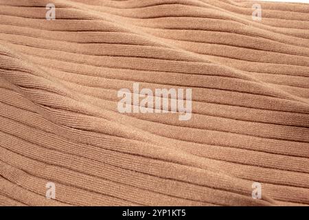 Texture du pull tricoté marron. Arrière-plan Banque D'Images