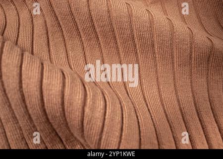 Texture du pull tricoté marron. Arrière-plan Banque D'Images