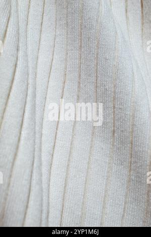 Texture de pull en tricot beige. Concept d'arrière-plan Banque D'Images