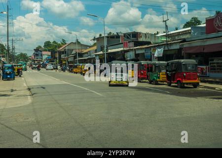 Tricycles aux Philippines qui est un mode de transport commun. Banque D'Images