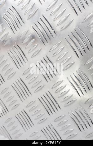 Gros plan du métal de la plaque de seuil à motifs Banque D'Images