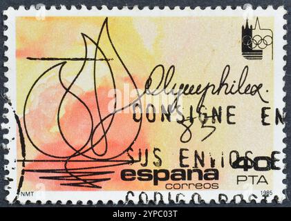Timbre-poste oblitéré imprimé par l'Espagne, qui promeut l'exposition internationale des timbres OLYMPHILEX '85 Lausanne, vers 1985. Banque D'Images