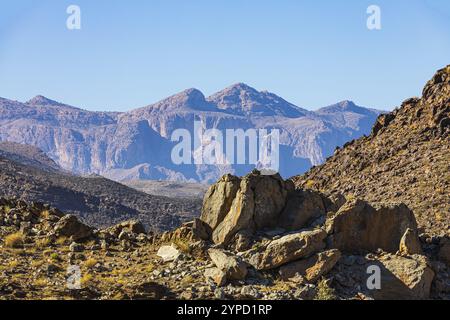 Rochers à l'aube, derrière la plus haute montagne d'Oman, Jebel Shams, péninsule arabique, Sultanat d'Oman Banque D'Images