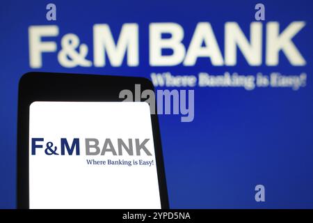 9 avril 2024, Brésil. Dans cette illustration photo, le logo F&M Bank est affiché sur l'écran d'un smartphone et en arrière-plan Banque D'Images