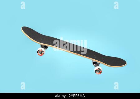 Un skateboard sur fond bleu clair. EQUIPEMENT sportif Banque D'Images