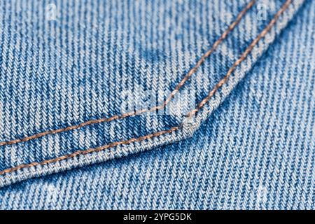 Texture denim. Gros plan de tissu de jeans avec couture Banque D'Images