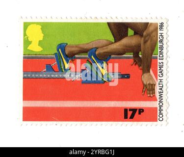 Timbre-poste vintage des Jeux du Commonwealth de 1986 de Grande-Bretagne représentant la course à pied. Banque D'Images