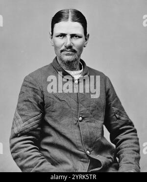 Sergent Thomas H. 'Boston' Corbett (1832 ? Disparu le 26 mai 1888) soldat qui a tué John Wilkes Booth, l'assassin du président Abraham Lincoln le 26 avril 1865. Connu pour ses croyances religieuses pieuses et son comportement excentrique, Corbett serait un bon soldat et aurait été prisonnier de guerre à la prison d'Andersonville. Corbett tire et blesse mortellement Booth lorsque son régiment encercle la grange dans laquelle Booth se cache Banque D'Images