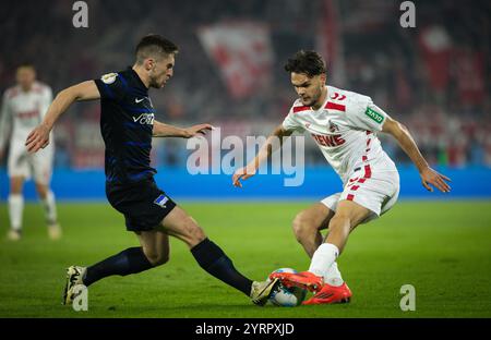 Cologne, Allemagne. 04 décembre 2024. Max Finkgräfe (Köln) Jonjoe Kenny (Hertha) 1. FC Köln - Hertha BSC Berlin 04.12.2024 Copyright (nur für journaliste Banque D'Images