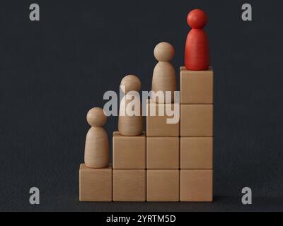 poupée homme en bois rouge sur le dessus de l'échelle sur fond noir. Escaliers succès leadership de l'entreprise opportunités de croissance de carrière progression de la performance Banque D'Images