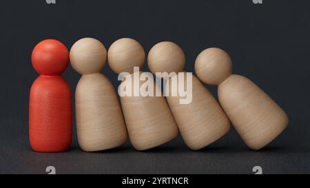 Se démarquer de la foule. Succès, individualité, unicité, leadership.leader travail d'équipe et Success.3D rendu sur fond noir. Banque D'Images