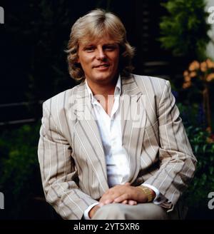 Peter Holm, alias Peter Gustaf Carl Sjöholm, schwedischer Pop Sänger, Ehemann der englischen Schauspielerin Joan Collins, Portrait, vers 1985. Banque D'Images